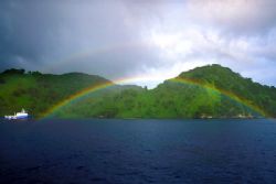 Cocos Island, after one of the frequent rain showers (Nik... by Andrew Dawson 
